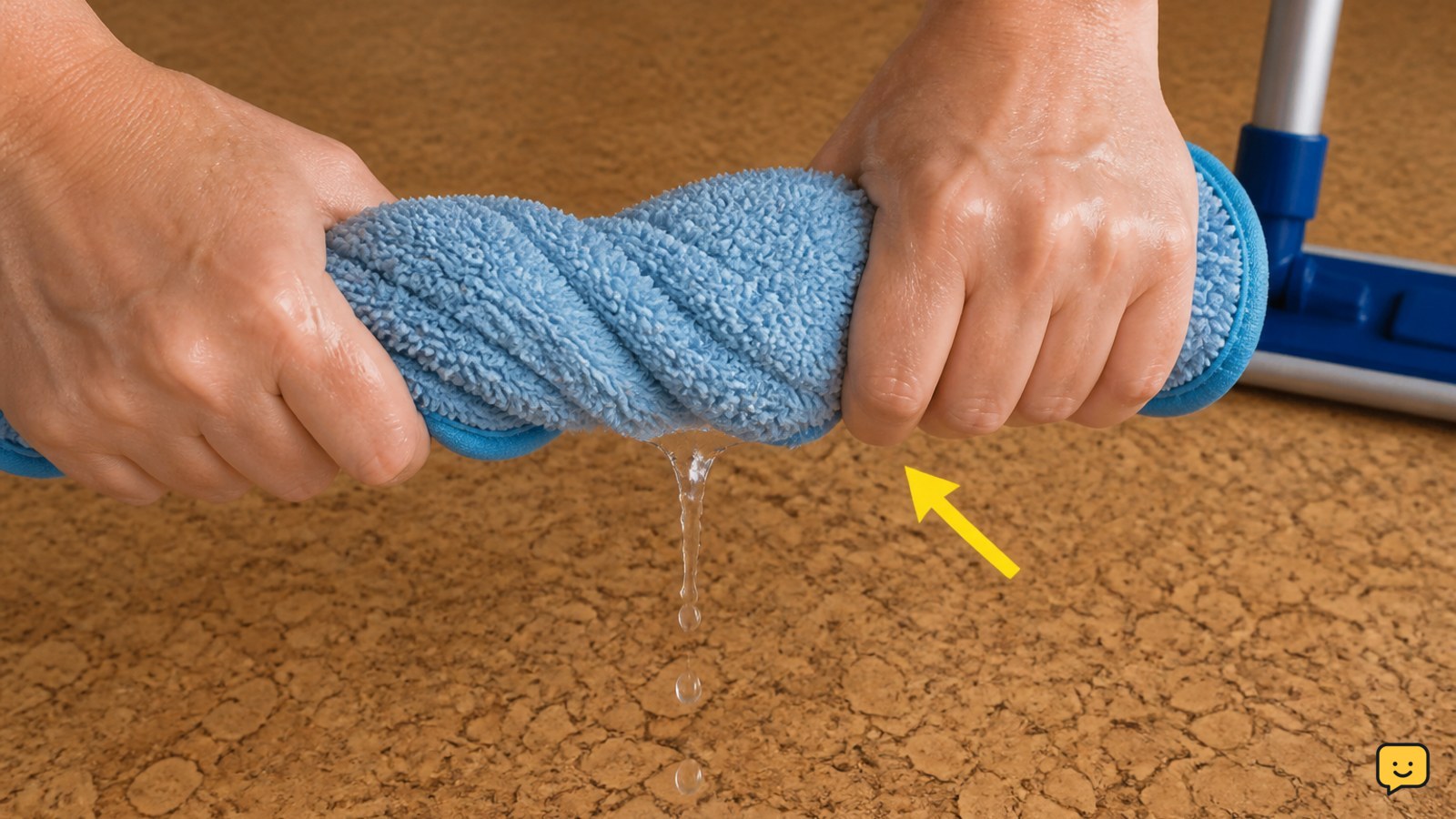 Hands wringing a microfiber mop until it is damp rather than dripping above cork flooring