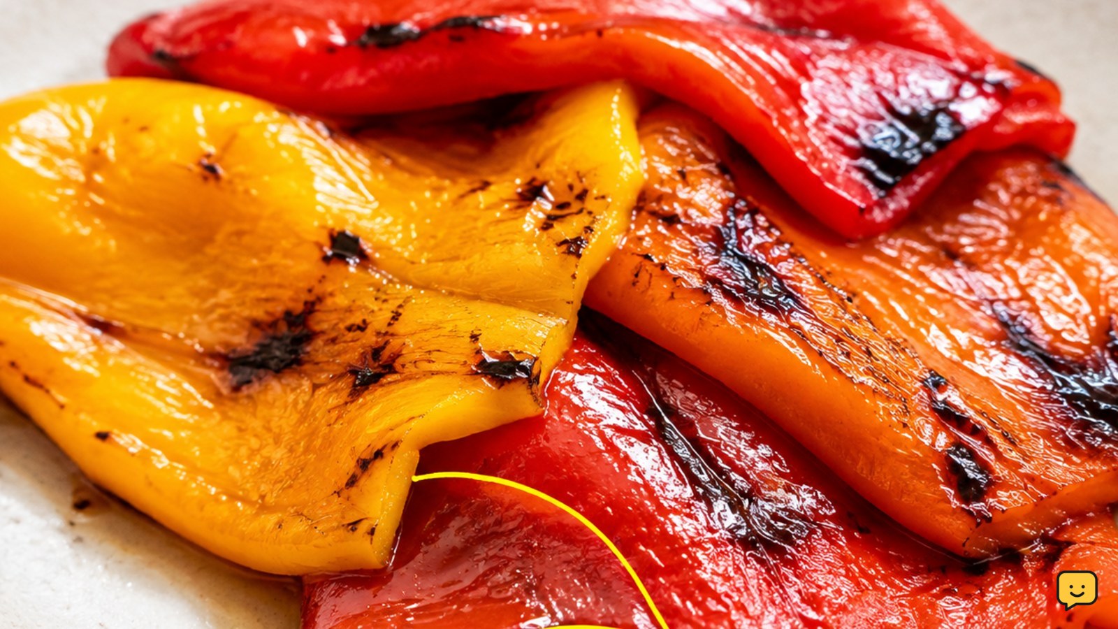 Peeled roasted sweet pepper strips with tender flesh and light char marks